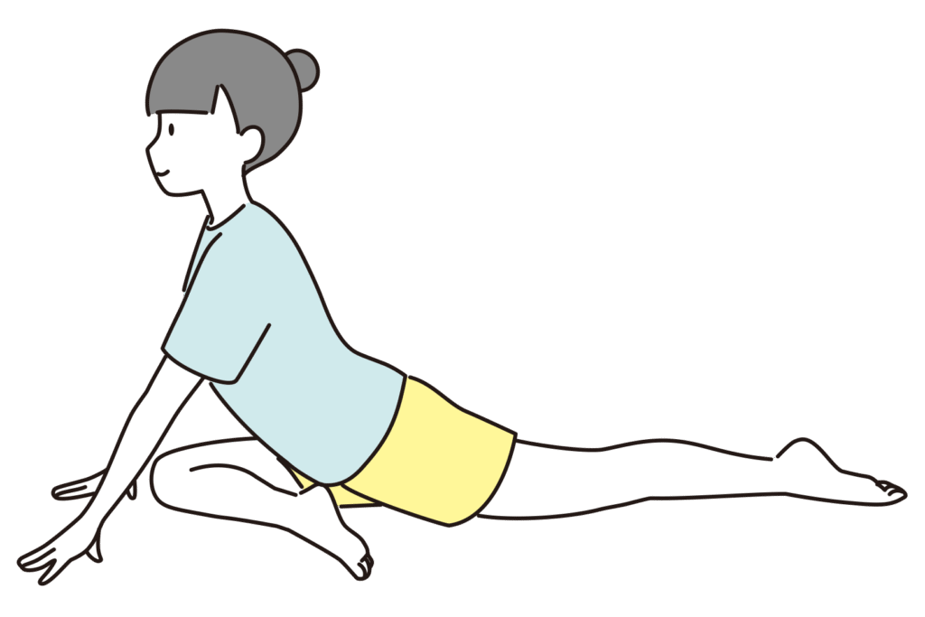 スワンのポーズをする女性