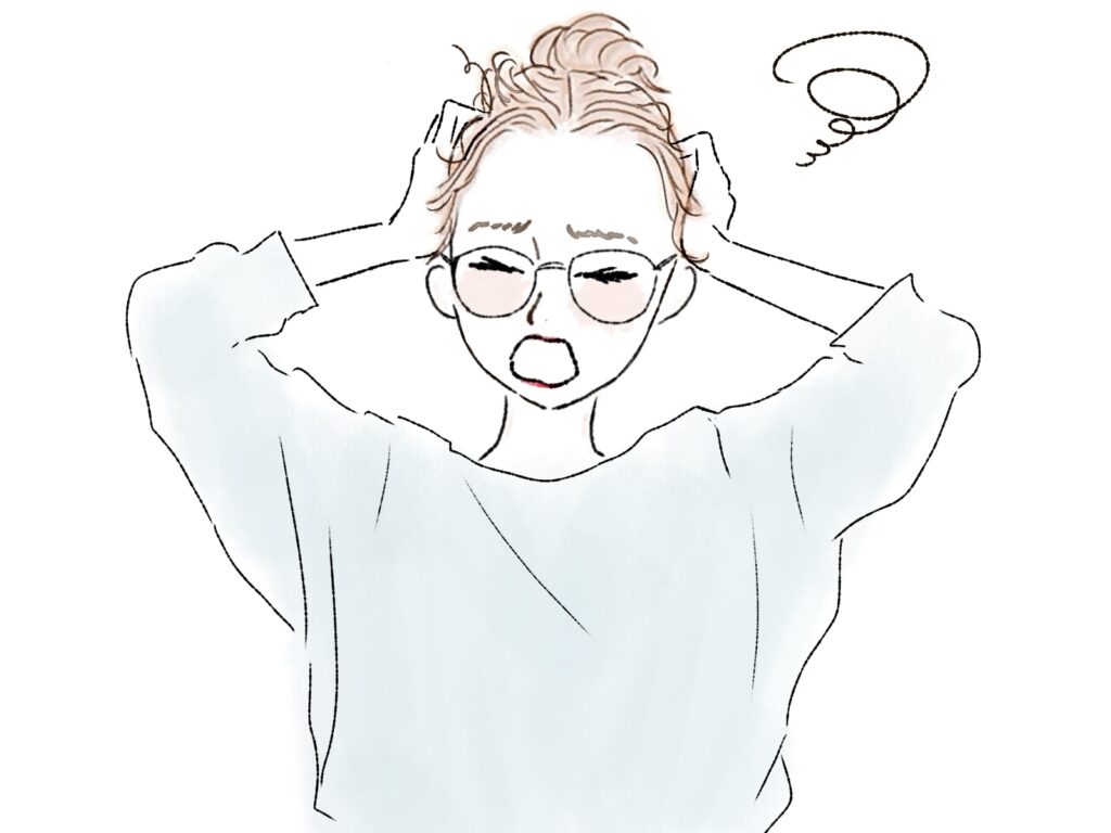 頭を抱える女性