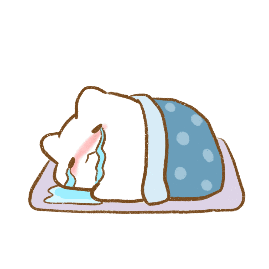 布団の中で号泣している猫